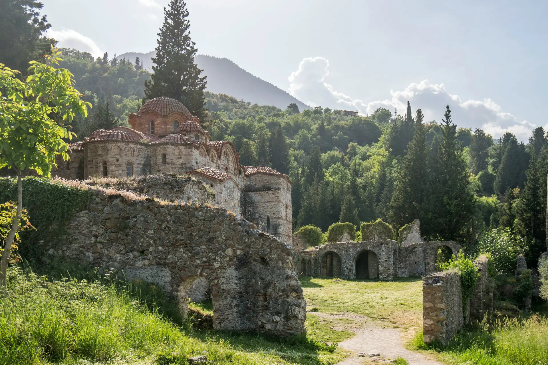 How to Plan a Trip to Greece So It Actually Flows 3 a church in monemvasia in lush greenery