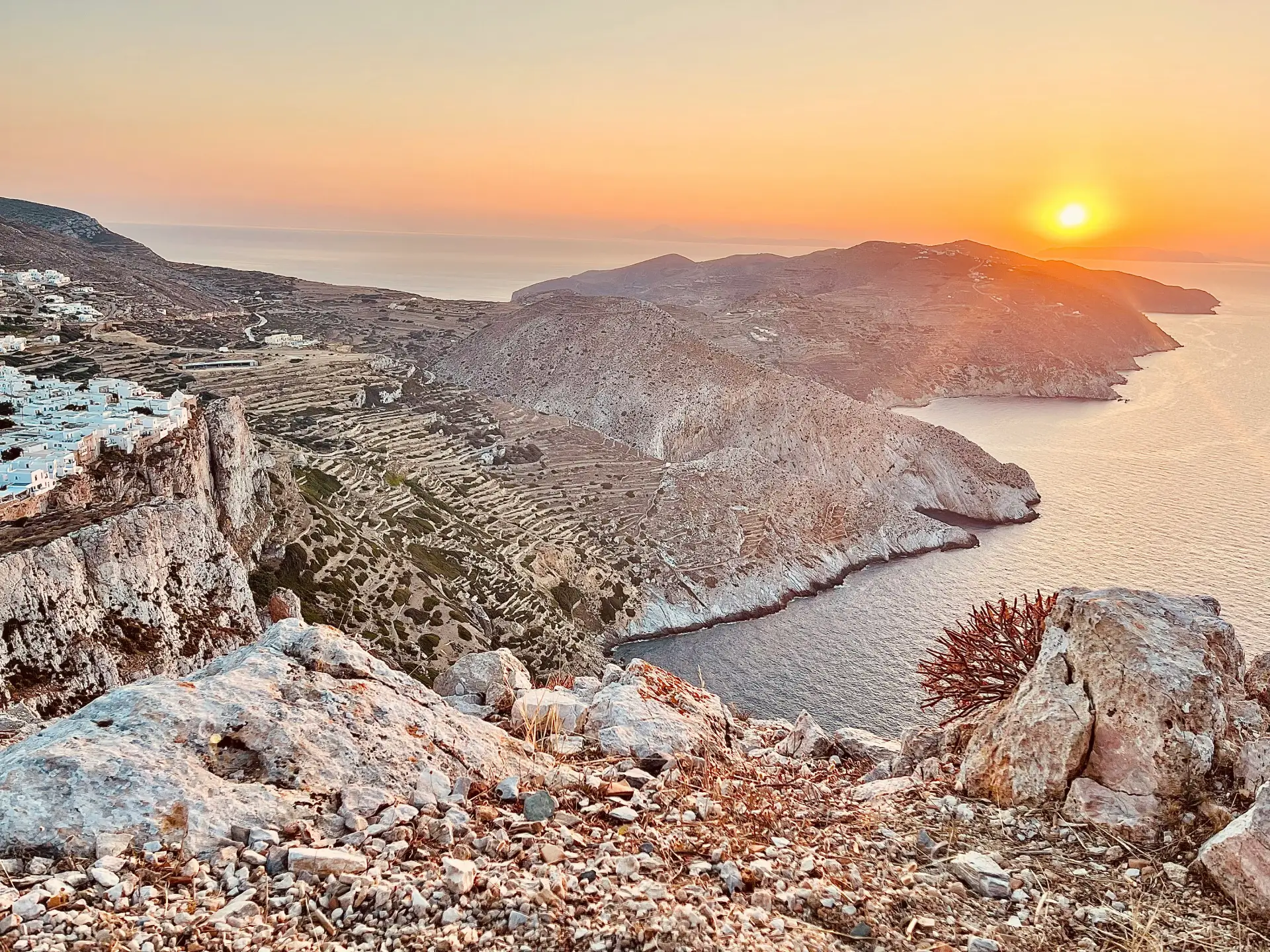 view of the sunset from the steep rock formations of Folegandros island